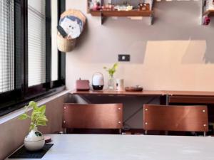 Gambar di galeri bagi 暖南小安民宿The Warm Tain-An Hostel-台南火車站-新樓醫院-背包客房-可包層-可包房-可包棟-獨旅友善民宿 di Ching-chung-san-ts'un