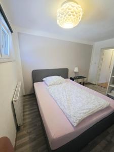Letto o letti in una camera di Apart Weinberg 1 - 6 Personen Ferienwohnung