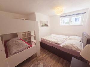 Letto o letti in una camera di Apart Weinberg 1 - 6 Personen Ferienwohnung