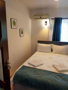 Postel nebo postele na pokoji v ubytování Casa Darius Cluj