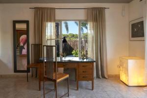 Foto sihtkohas Cala Llena asuva majutusasutuse Hostal Flamingo by Nest galeriist