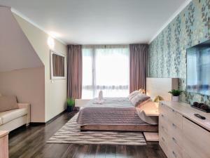Postel nebo postele na pokoji v ubytování Tiché Anenské Apartmány s hotelovým servisem a s kvalitní snídaní na apartmán - by Relax Harrachov