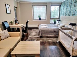 Postel nebo postele na pokoji v ubytování Tiché Anenské Apartmány s hotelovým servisem a s kvalitní snídaní na apartmán - by Relax Harrachov