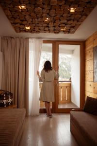 Ένα ή περισσότερα κρεβάτια σε δωμάτιο στο Hotel Dahu