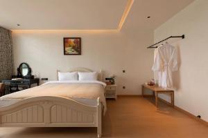 Dali Blue House Sea View B&B客房内的一张或多张床位