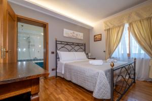 Postel nebo postele na pokoji v ubytování Agriturismo Beata Vanna