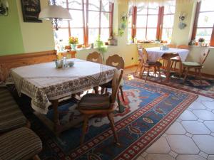 Posezení v ubytování Haus Sundl - Privatzimmer + 31 fotografií