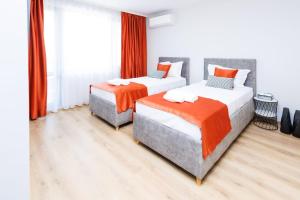 Postel nebo postele na pokoji v ubytování Boulevard Hotel