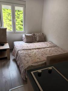 Postel nebo postele na pokoji v ubytování Villa JELENA - Guest House Nela