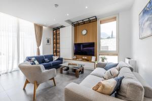 Μια τηλεόραση ή/και κέντρο ψυχαγωγίας στο Villa Dea Green Coast 166C