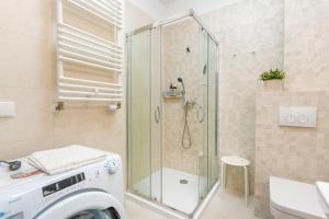 Koupelna v ubytování Apartament Sunset Resort 25 SurfingBird Grzybowo + 5 fotografií