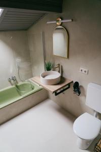 Ванная комната в Urban Boutique Apartments - SELF CHECK-IN