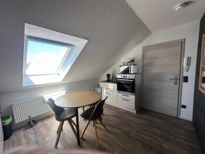 Kuchyň nebo kuchyňský kout v ubytování Ferienwohnung Zeitz - Weiße Elster Apartment