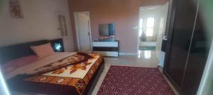 Postel nebo postele na pokoji v ubytování Diana Beach Villa spacious detached فيلا واسعه مستقله ديانا ONLY FAMILIES بيتش