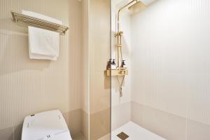 Baðherbergi á Hotel Ippda Gumdan