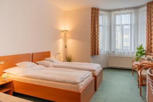 Hotel Krajka****客房内的一张或多张床位