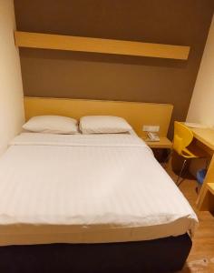 文冬特拉斯慕蒂亚拉酒店客房内的一张或多张床位