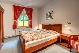 Cama ou camas em um quarto em Villa Lindemann