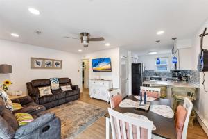 a living room with a couch and a table at 307 E Crocus Rd, Unit B in Wildwood Crest