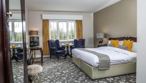 Ένα ή περισσότερα κρεβάτια σε δωμάτιο στο Springfort Hall Hotel
