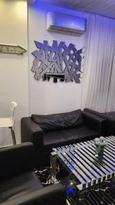 A seating area at TOTANI LUX