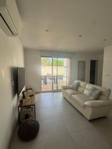 Χώρος καθιστικού στο Villa Domaine U Murtonu