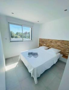 Ένα ή περισσότερα κρεβάτια σε δωμάτιο στο Villa Domaine U Murtonu +28 φωτογραφίες