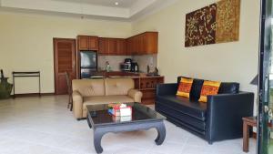 Kuchyň nebo kuchyňský kout v ubytování View Talay Holiday Resort