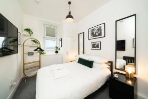 Ένα ή περισσότερα κρεβάτια σε δωμάτιο στο Princess Street Studios