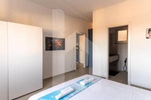 Postel nebo postele na pokoji v ubytování Homiday - Via Milano