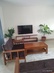 TV a/nebo společenská místnost v ubytování Casa Nampala 2bedrom units