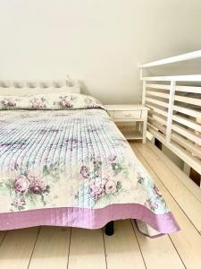 A bed or beds in a room at Masseria Lacatena