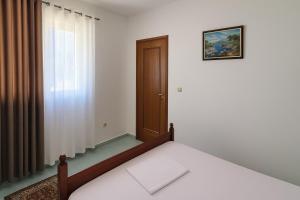 Letto o letti in una camera di Hotel Ardjan