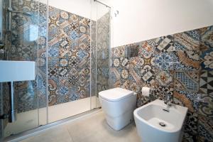 Et badeværelse på GuestHost - Borgo 84 Marzamemi - Angolo sul Mare + 11 billeder