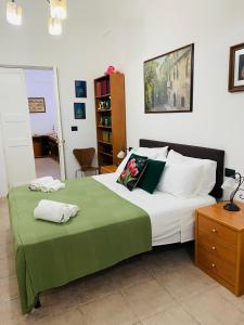 Una cama o camas en una habitación de Casa Dunja