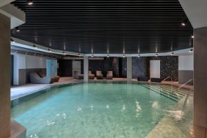 Bazén v ubytování Hotel Royal Village nebo v jeho okolí