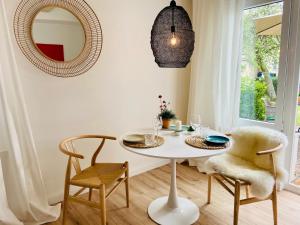 Φωτογραφία από το άλμπουμ του Brise Gartenhaus Brunnenstraße App 05 σε Heringsdorf