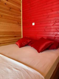 A bed or beds in a room at Izgen Bungalows