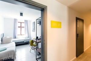 Posteľ alebo postele v izbe v ubytovaní Cooltour Hostel