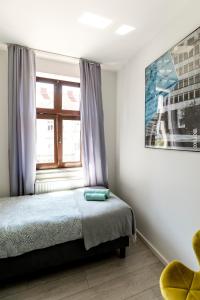 Posteľ alebo postele v izbe v ubytovaní Cooltour Hostel