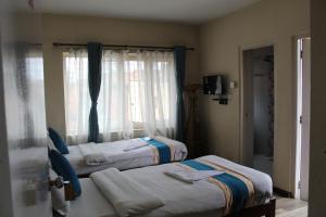 Postel nebo postele na pokoji v ubytování 32 Peace Home + 37 fotografií