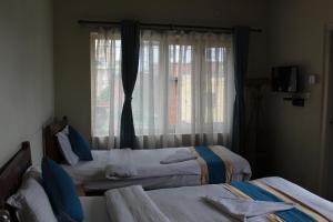 Una cama o camas en una habitación de 32 Peace Home