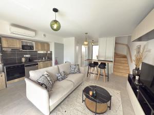 Η κουζίνα ή μικρή κουζίνα στο Residence Naia Confort et plage +12 φωτογραφίες