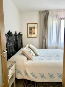 A bed or beds in a room at Masseria Lacatena
