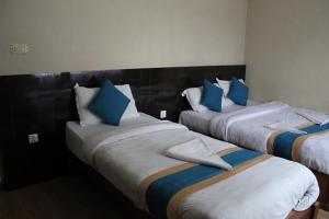Una cama o camas en una habitación de 32 Peace Home