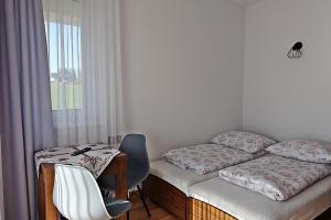 Postel nebo postele na pokoji v ubytování DW Jarosze