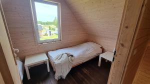 Postel nebo postele na pokoji v ubytování Domki Białe Zacisze