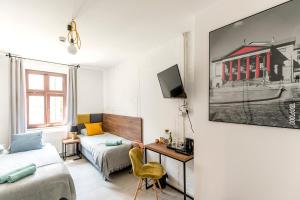 Posteľ alebo postele v izbe v ubytovaní Cooltour Hostel