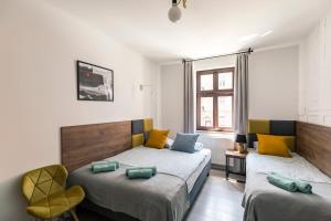 Posteľ alebo postele v izbe v ubytovaní Cooltour Hostel