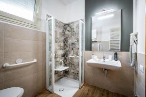 Ванная комната в Mareblù - Tuscany Green Aparthotel